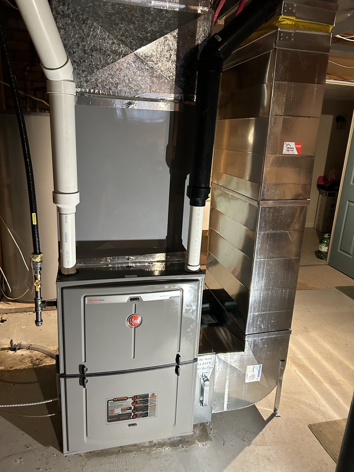 Rheem furnace and indoor heat-pump coil — the same installation
